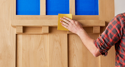 prepping a wooden door to stain